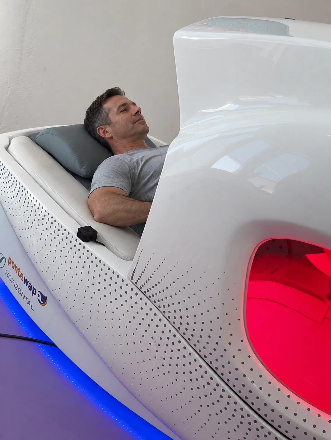 Man resting in a supported infrared bike — AI illustration